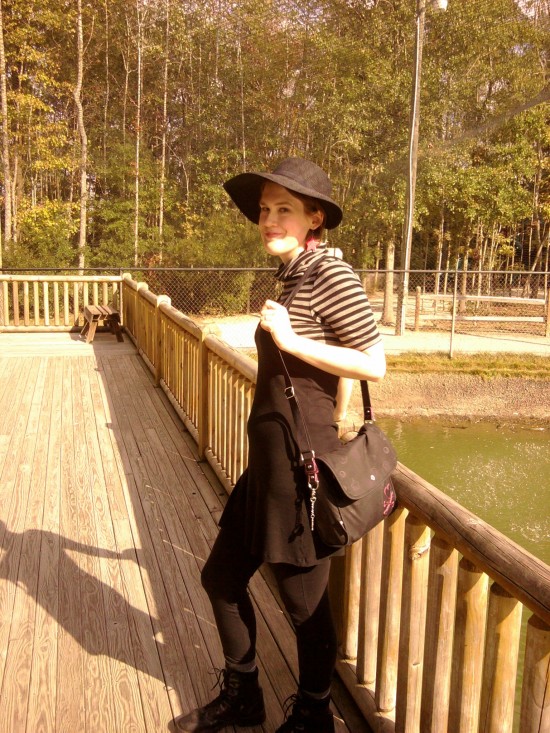 Me at the Bird Park Me standing against the railing at Sylvan Heights Bird Park