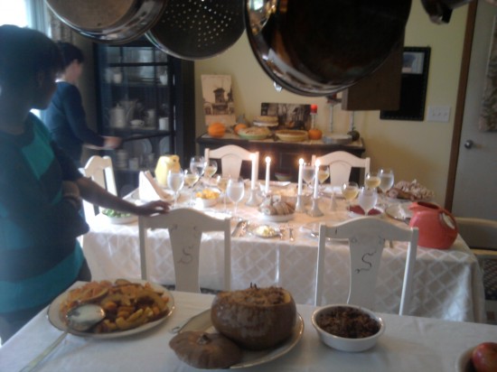 T-day spread A table covered in good eats with lit candles